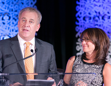 <div>
	<div>
		Mark Simon (L) and Tracey Simon (R) accept the Award of Hope for Corporate Leadership on behalf of PricewaterhouseCoopers, LLP.&nbsp;</div>
</div>
<div>
	&nbsp;</div>
