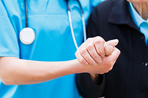 nurse holding hand