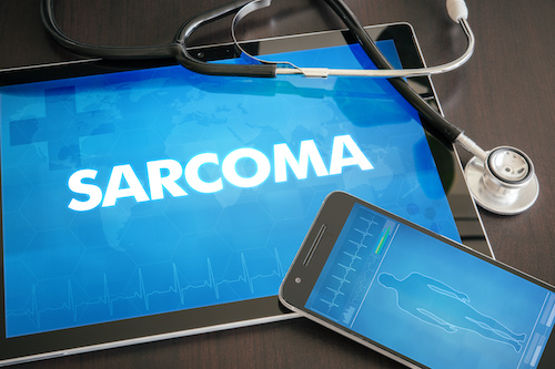 word sarcoma shown on blue background of ipad