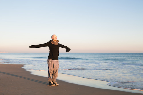 woman standing on beach