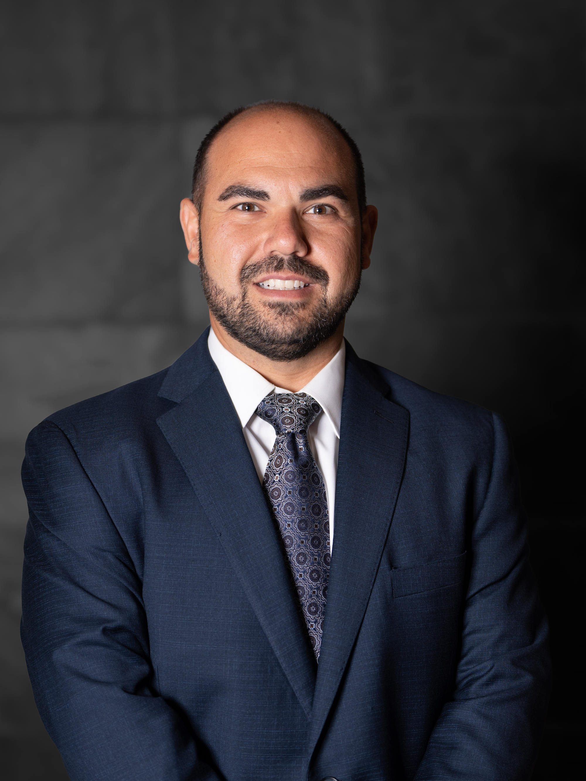 Headshot of John Poundardjian