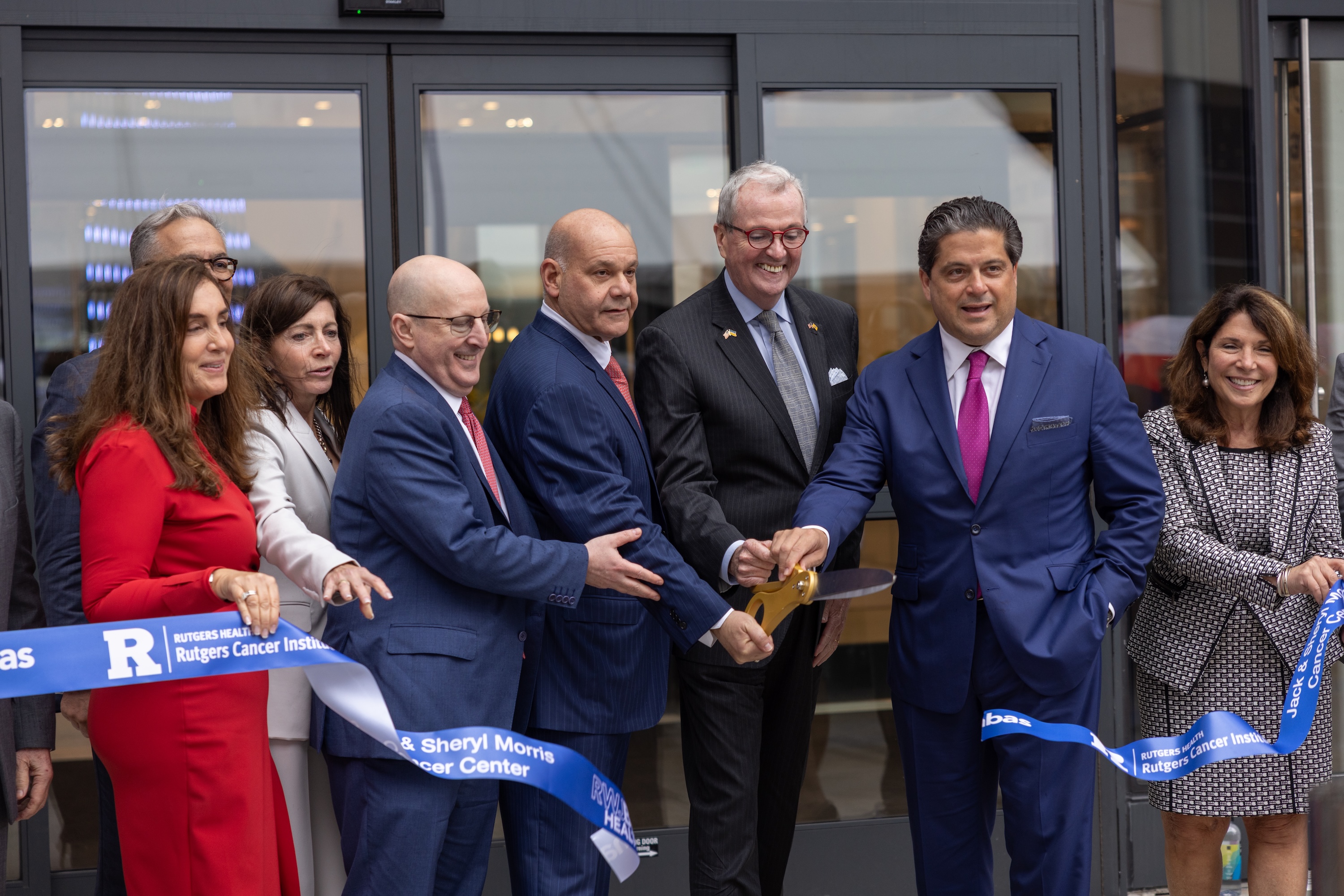 Sheryl Morris, Steven Libutti, Jack Morris, Phil Murphy, Mark Manigan and Susan Solometo cut the ribbon for the Jack & Sheryl Morris Cancer Center
