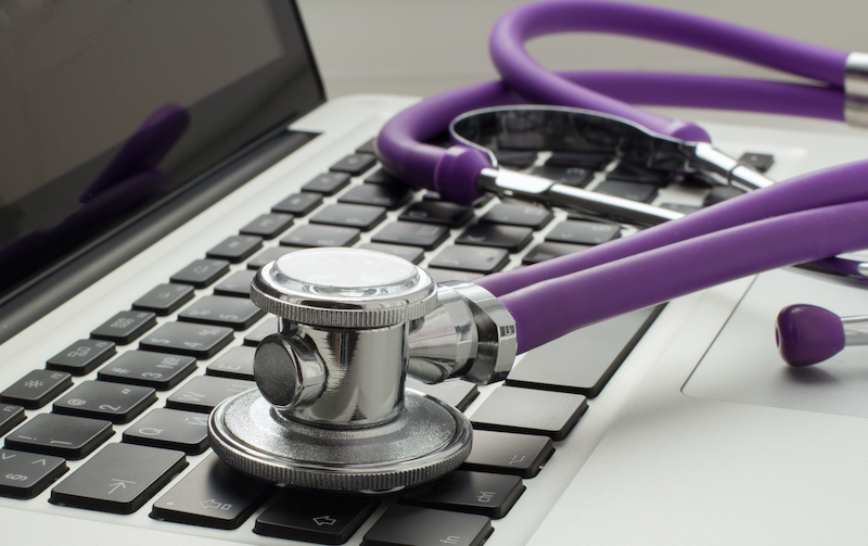 stethoscope on laptop