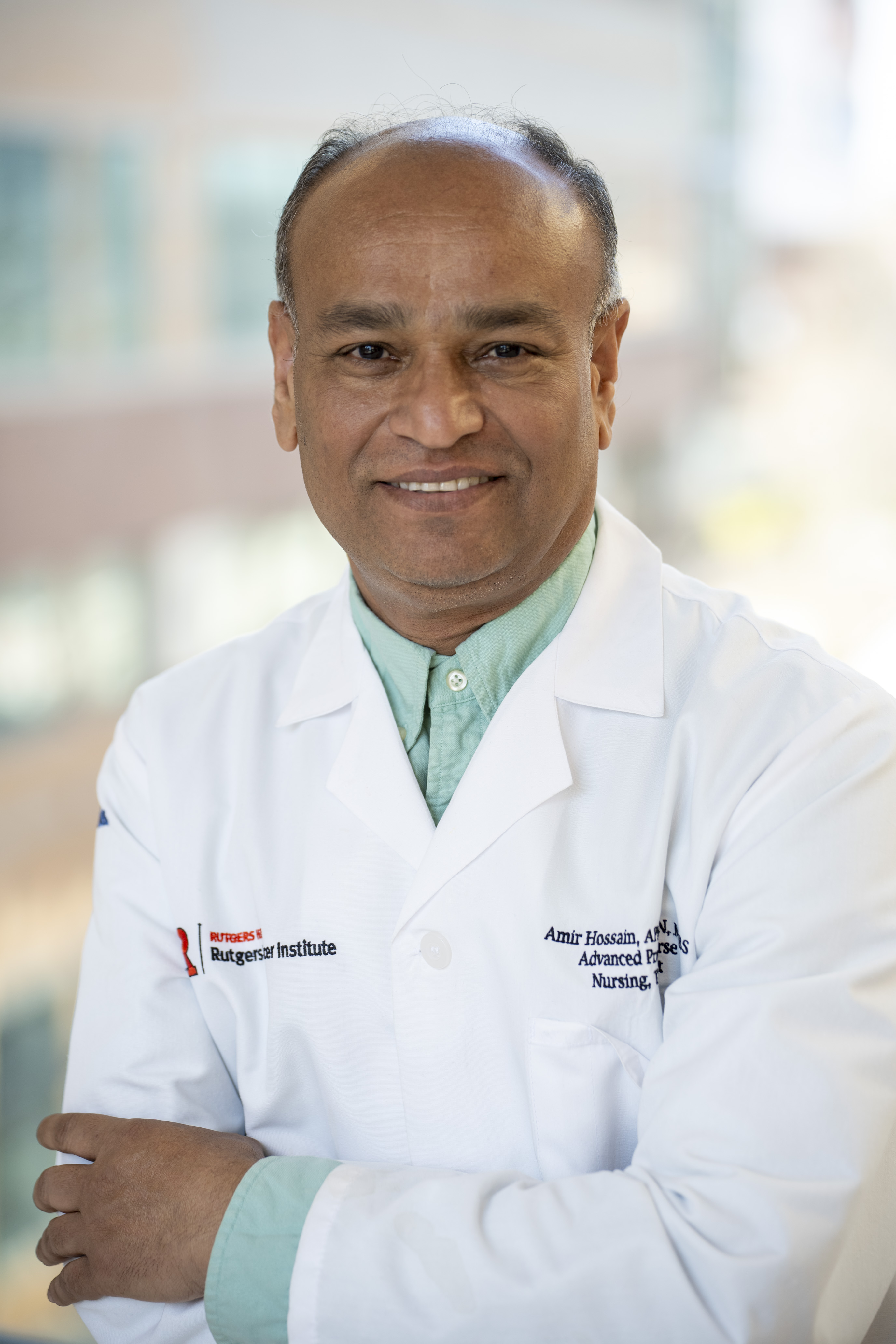 Headshot of Amir Hossain, APN, FNP-C, MBBS