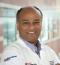Headshot of Amir Hossain, APN, FNP-C, MBBS