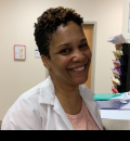 Tareai Pruitt-Smith in clinic coat