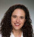 Valerie Shander in white coat